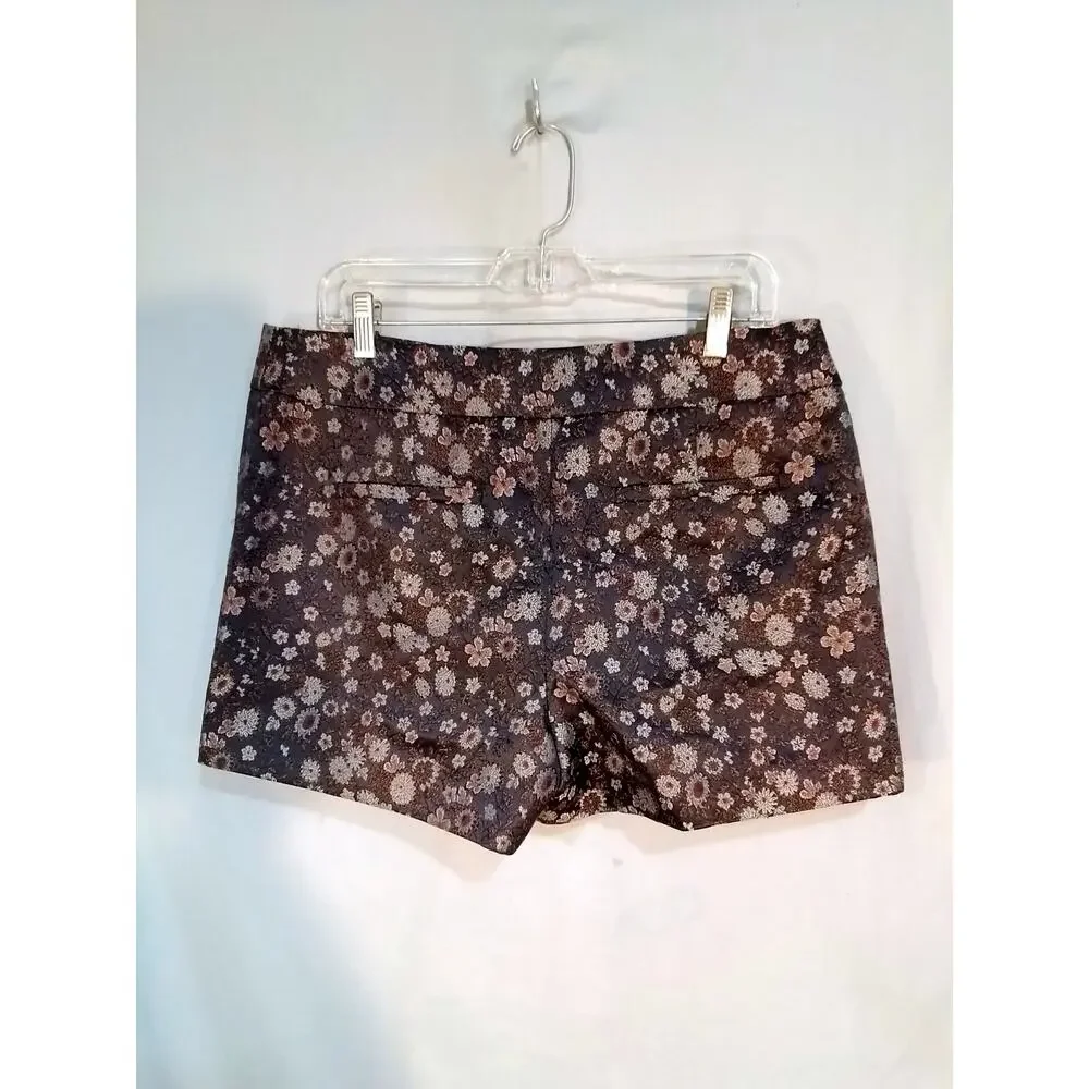 Gray tapestry shorts. Silver and rusty flowers on black background